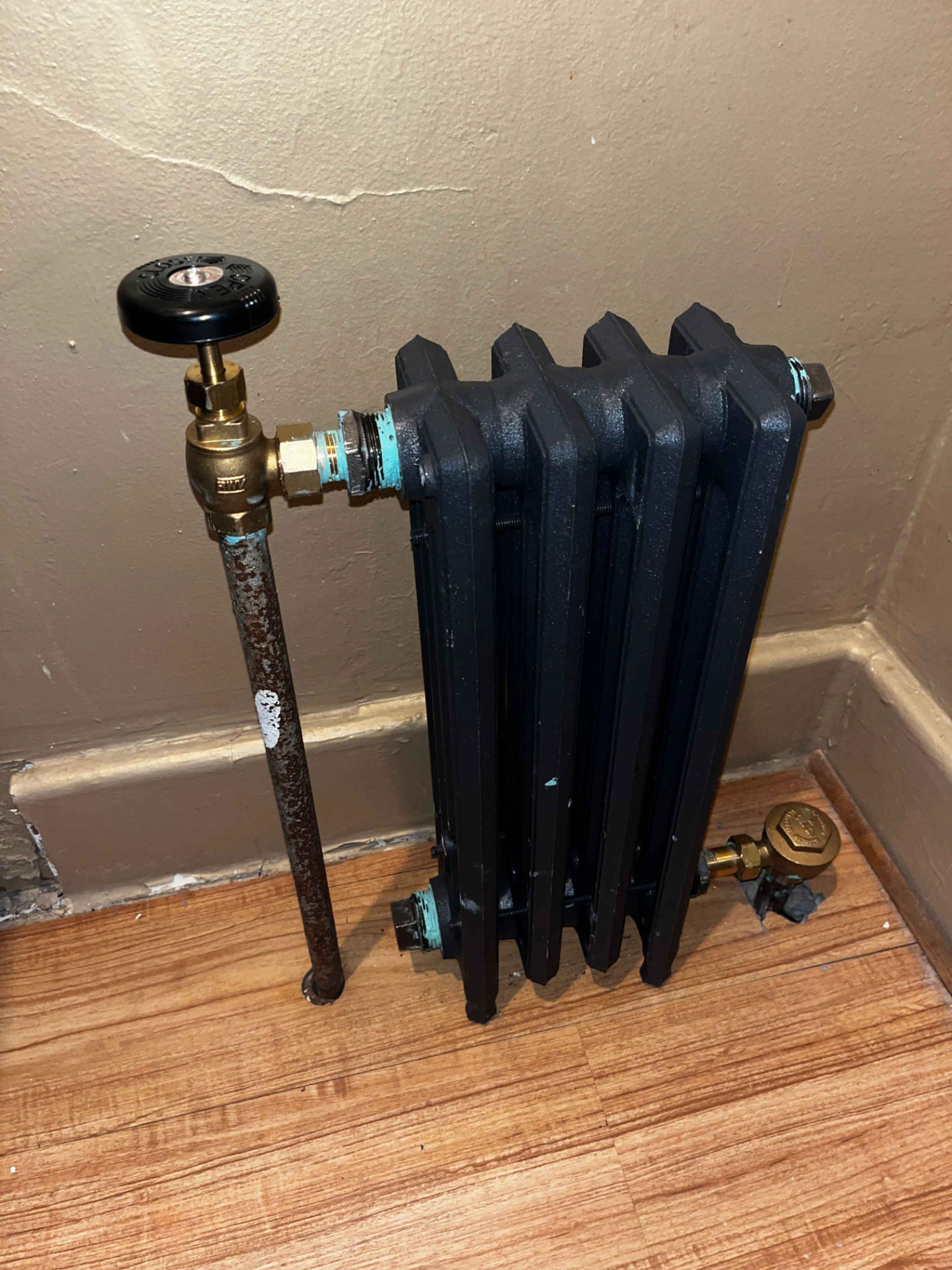 Cast-iron radiator and riser replacement — Restored steam heat to an upstairs room